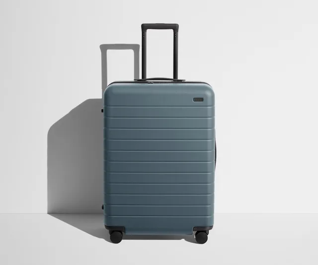 away-medium-valise-soute-rigide-coast-blue-compression image 1