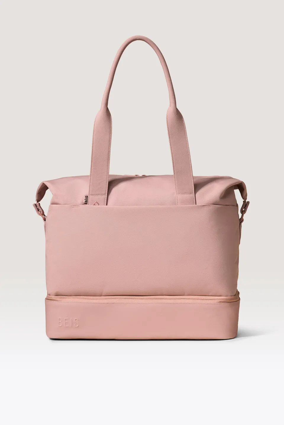 beis-the-weekender-sac-week-end-rose-fond-chaussures image 1