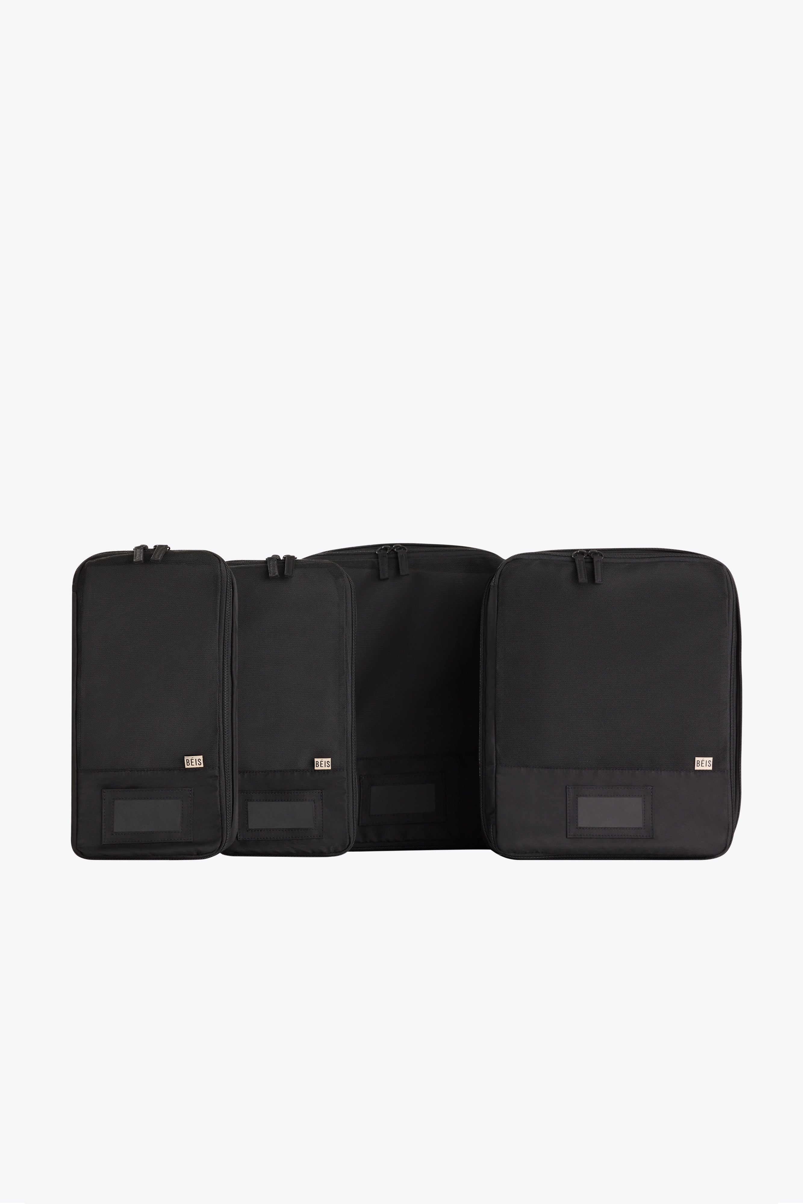 beis-compression-lot-4-cubes-rangement-noir-valise image 1