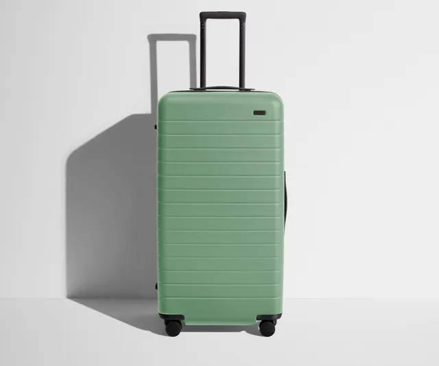away-trunk-valise-soute-rigide-sea-green-compression image 1